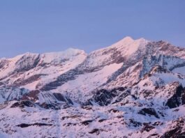 The peak is named after the 6th Dalai Lama, Tsangyang Gyatso