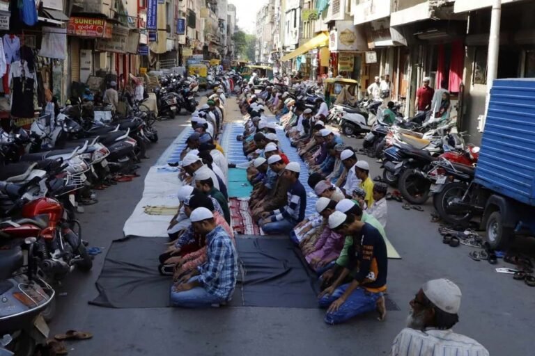 People offer namaz on the road